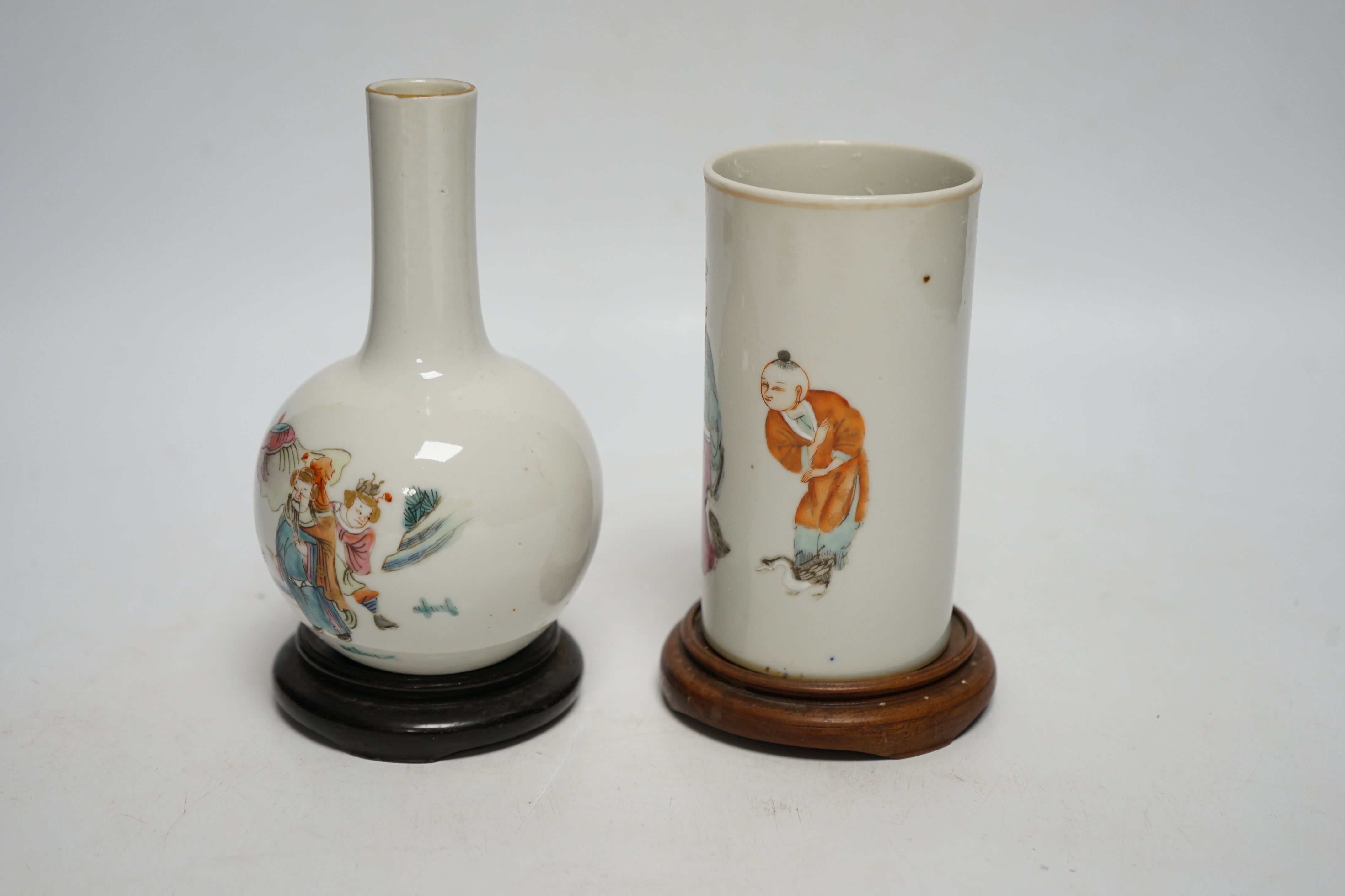A Chinese famille rose brush pot and bottle vase, both with stands, tallest 16cm